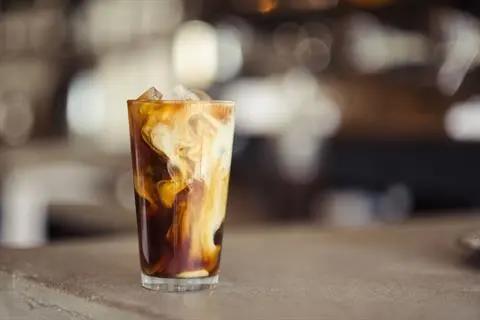Iced coffee protein drink in a tall glass